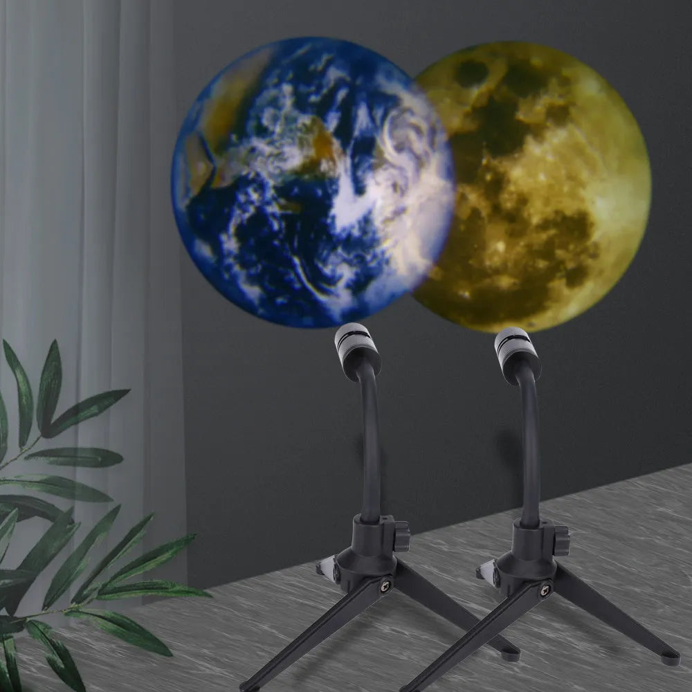 Earth and moon projection lamp with adjustable bracket on wooden surface