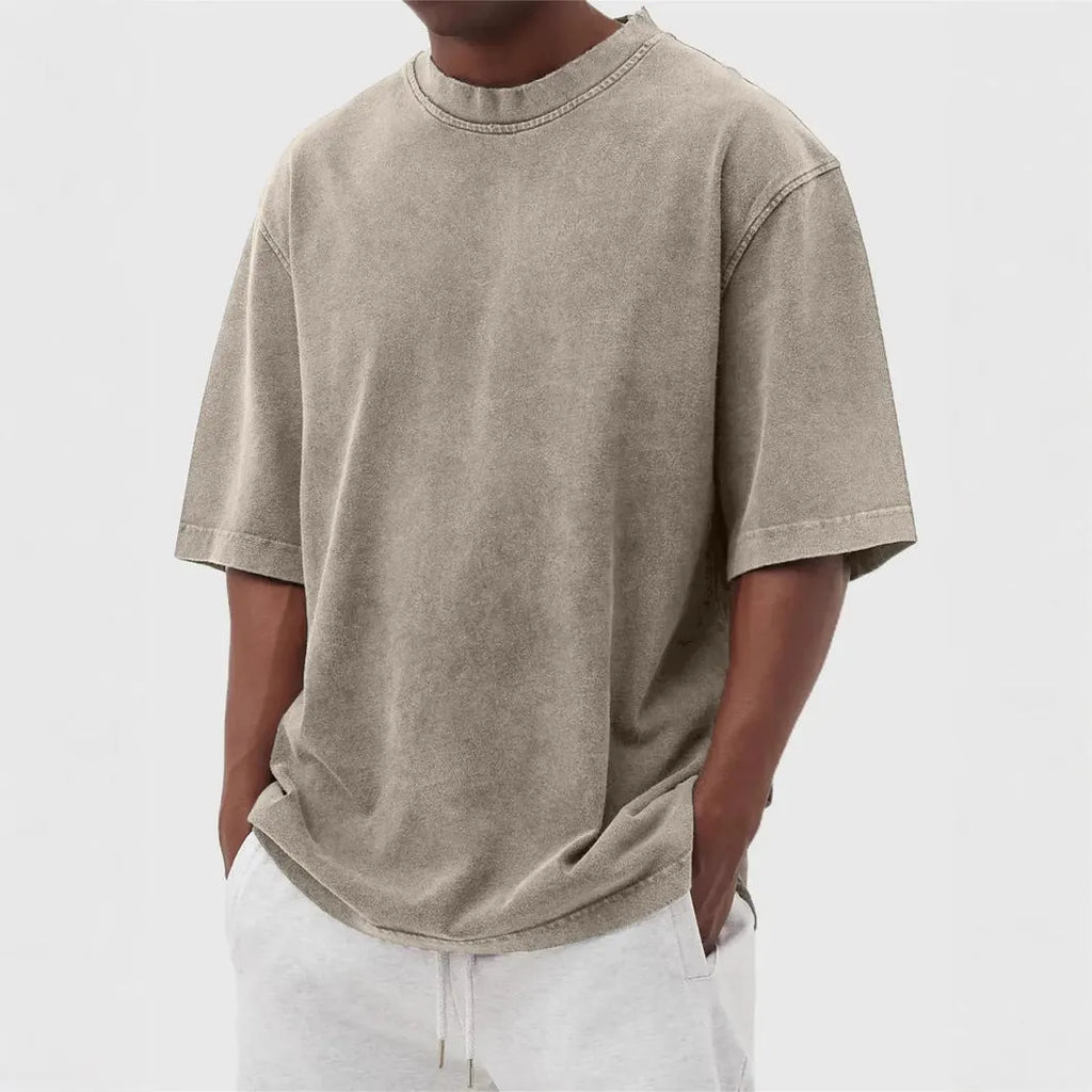 Men's stone washed distressed t-shirt in loose fit with half sleeves available in multiple colours