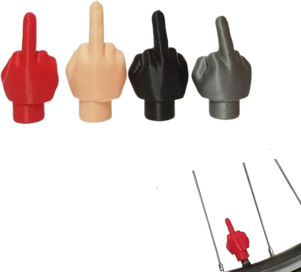 Eight latex car tyre valve caps, four black and four skin colour, for dust protection.