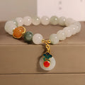 Women's ice jade bracelet with pearl accents and xiangyun peace jade buckle in retro design