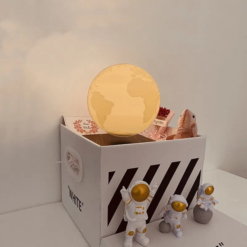 Maglev floating moon planet night light with astronaut figurines and LED illumination