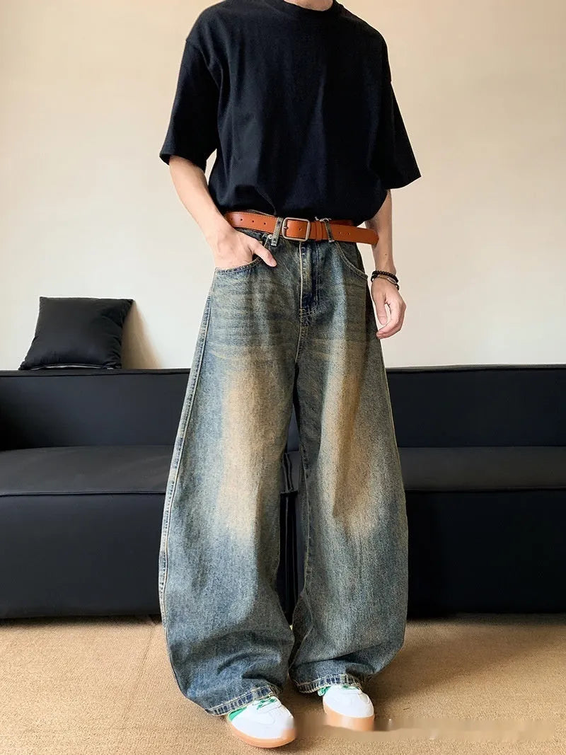 Men's retro blue distressed wide-leg denim trousers with machete styling detail