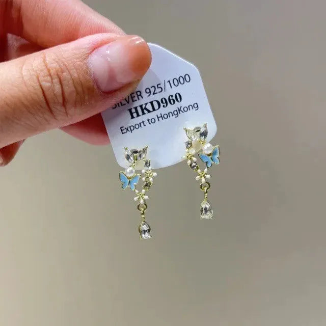 Women's alloy heart-shaped clip earrings with rhinestones, little star charms, and tassel in geometric fresh style design