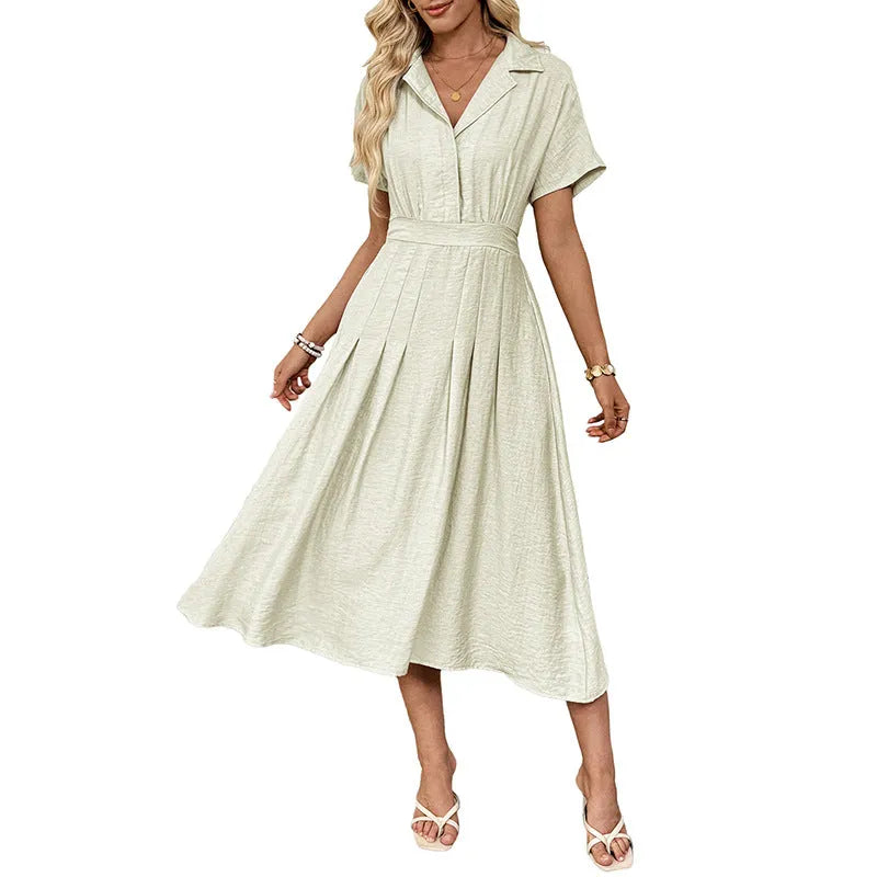 Light green women's shirt dress with lapel collar, defined waist, and pockets on a model.