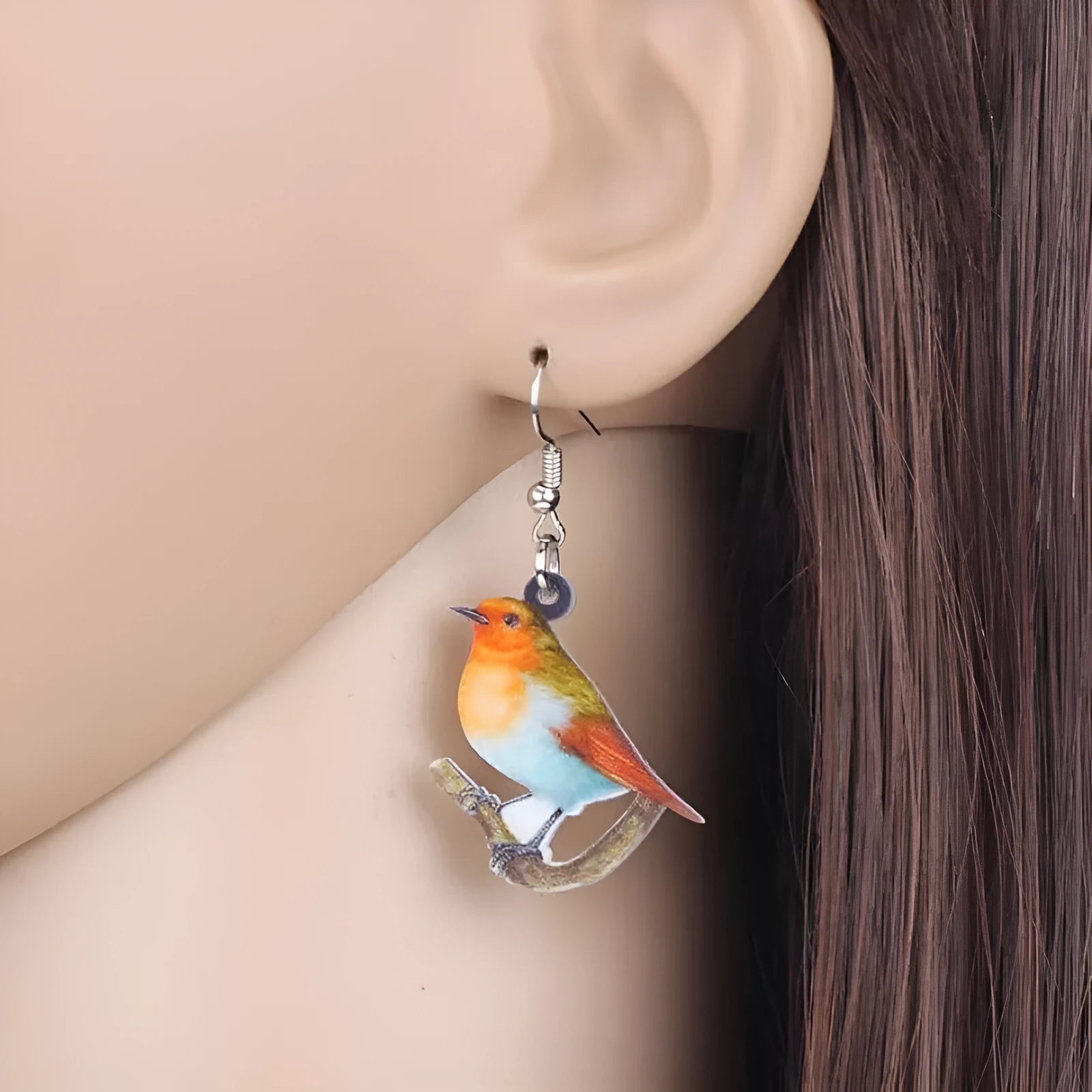 Blue titmouse pendant acrylic earrings with geometric snake motifs in two colour options