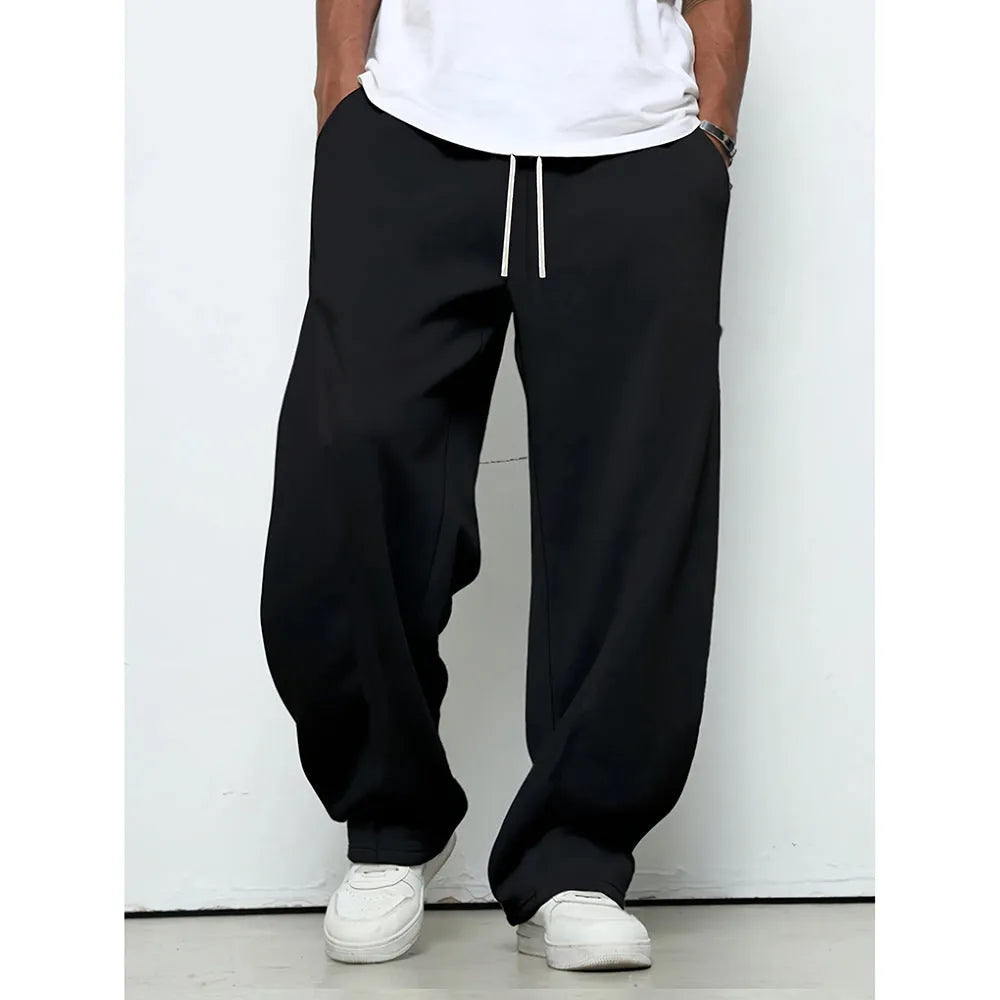 Men's solid colour straight leg casual trousers with a drawstring waistband.