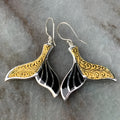 Women's fishtail shaped earrings with whale design in white gold colour alloy