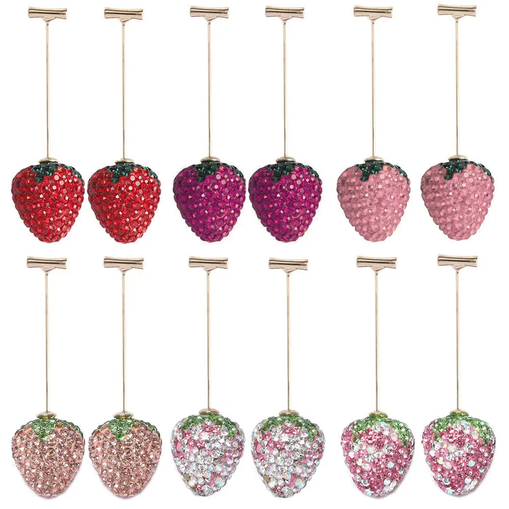 Geometric strawberry-shaped stud earrings with spot drill crystal details in red colour option