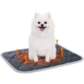 Grey cloth pet cushion in rectangular shape on floor as dog or cat bed