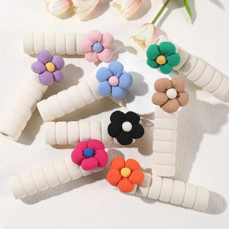 Round floral door handle protective casing in soft PEVA material showing anti-collision function