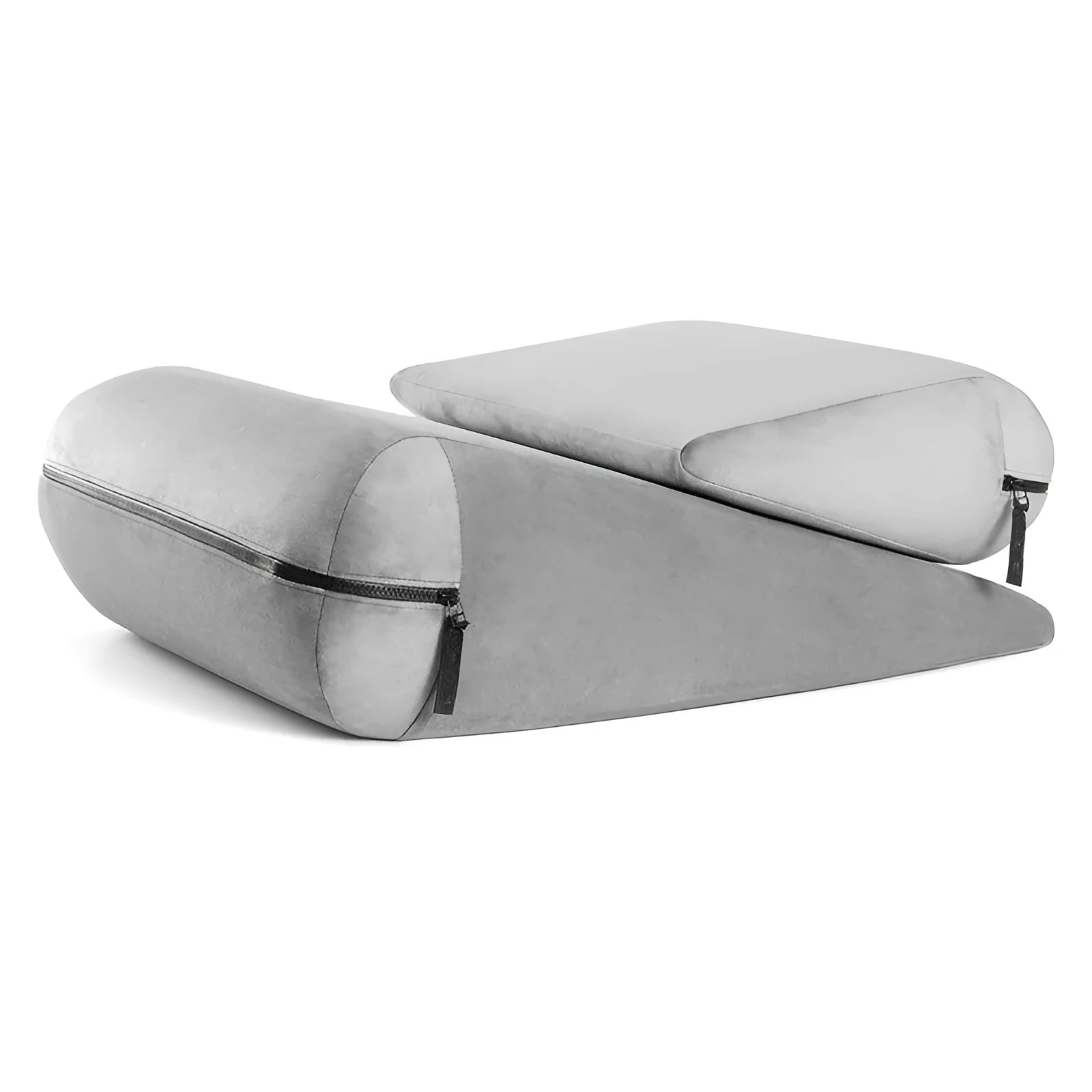 A triangular wedge cushion with an embroidered texture in a choice of colours, shown next to a sofa corner.