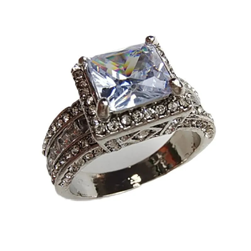 Silver alloy geometric women's engagement ring with round elements in gold or white electroplated finish