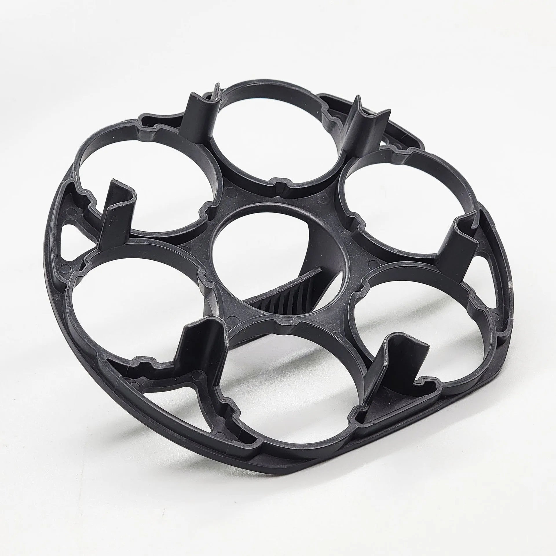 Black plastic egg holder basket for cooking machines measuring 13.8 x 12.6 x 5.7 cm