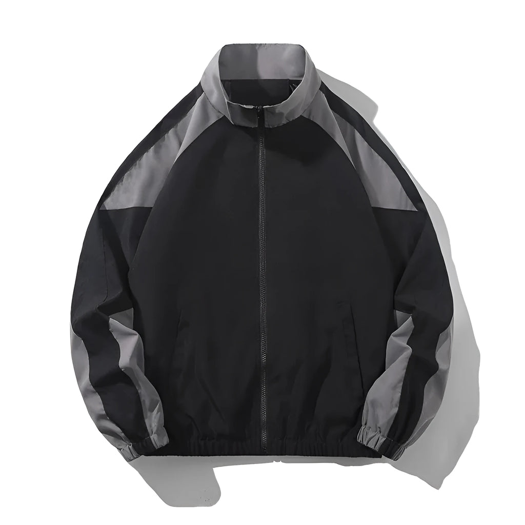 Men's black casual jacket with contrast stitching and side pockets, laid flat.