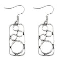 Geometric round earrings with irregular square design in antique silver finish