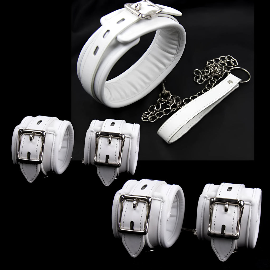White PU sponge bondage restraint set showing handcuffs, footcuffs, and neck scarf components