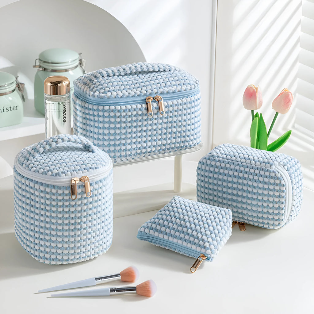Four cube-style flannelette makeup bags in polyester with modern simplicity design