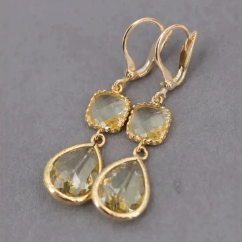 Gold geometric crystal fringe drop earrings with water droplet elements