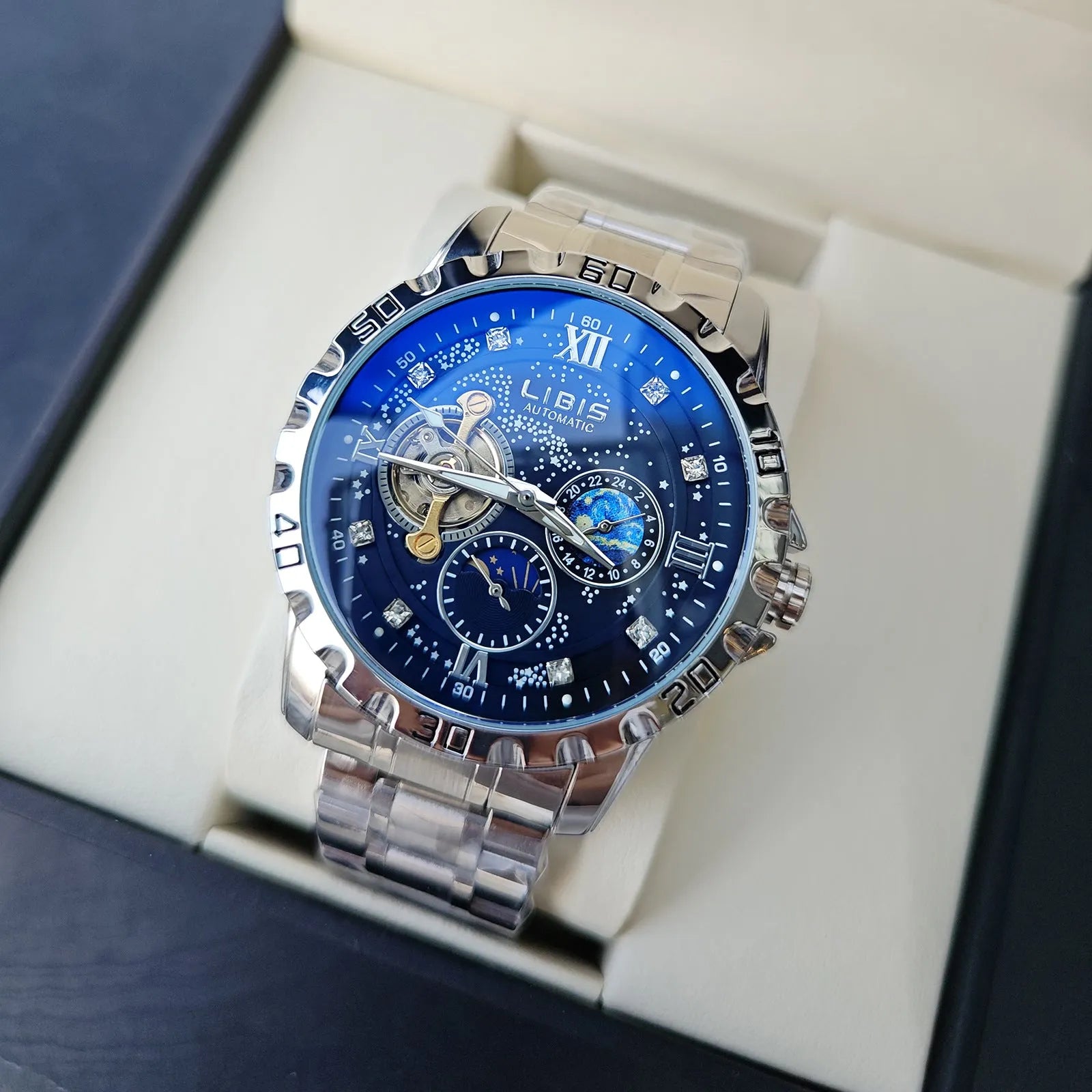 Men's silver automatic watch with black starry luminous dial and leather strap