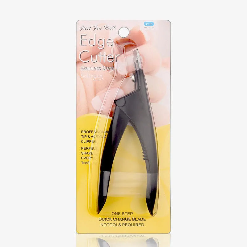 Stainless steel French U-shaped nail art scissors on a neutral background.