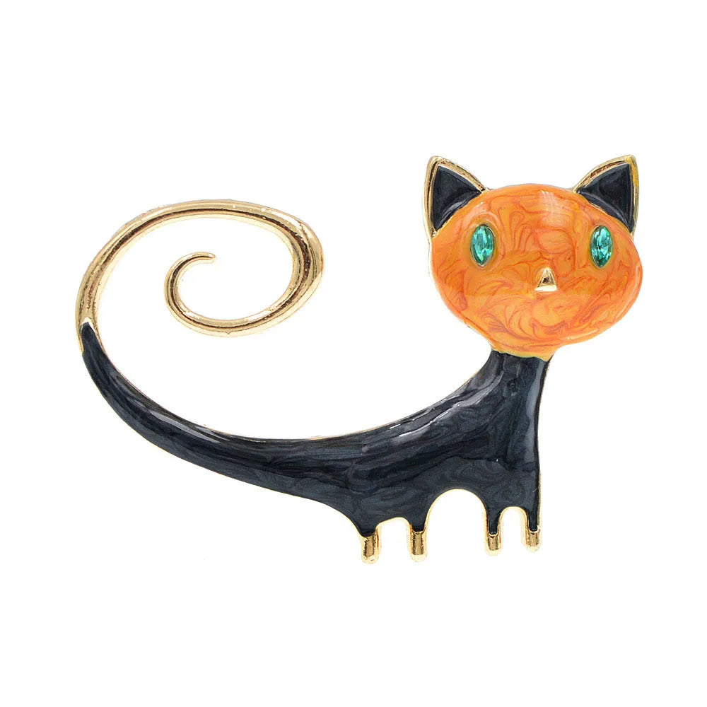 Close-up of an orange painted cat tail brooch made from alloy metal with a pin clasp.