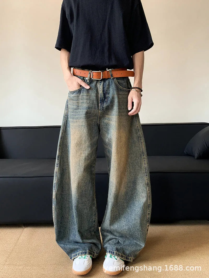 Men's retro blue distressed wide-leg denim trousers with machete styling detail