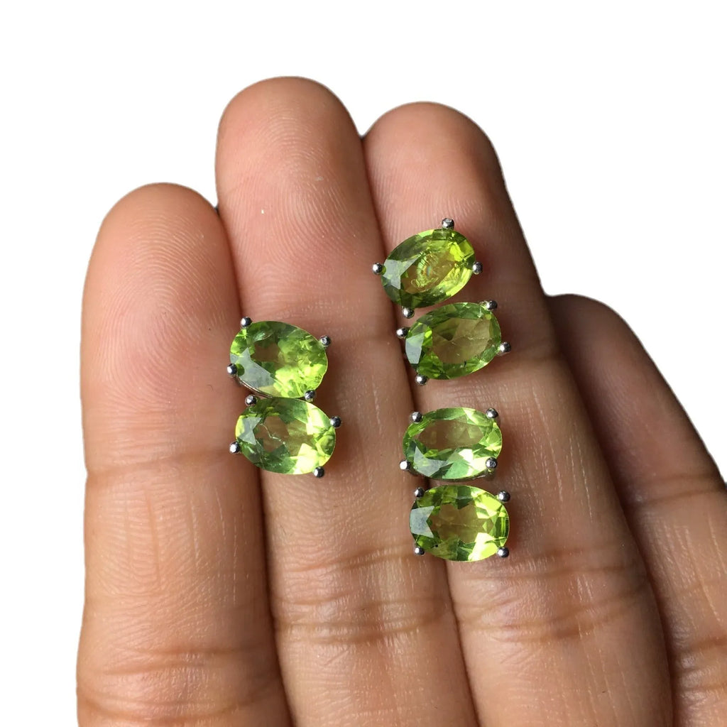Natural olivine stud earrings in grass green set in S925 silver with 6×8mm oval faceted stone
