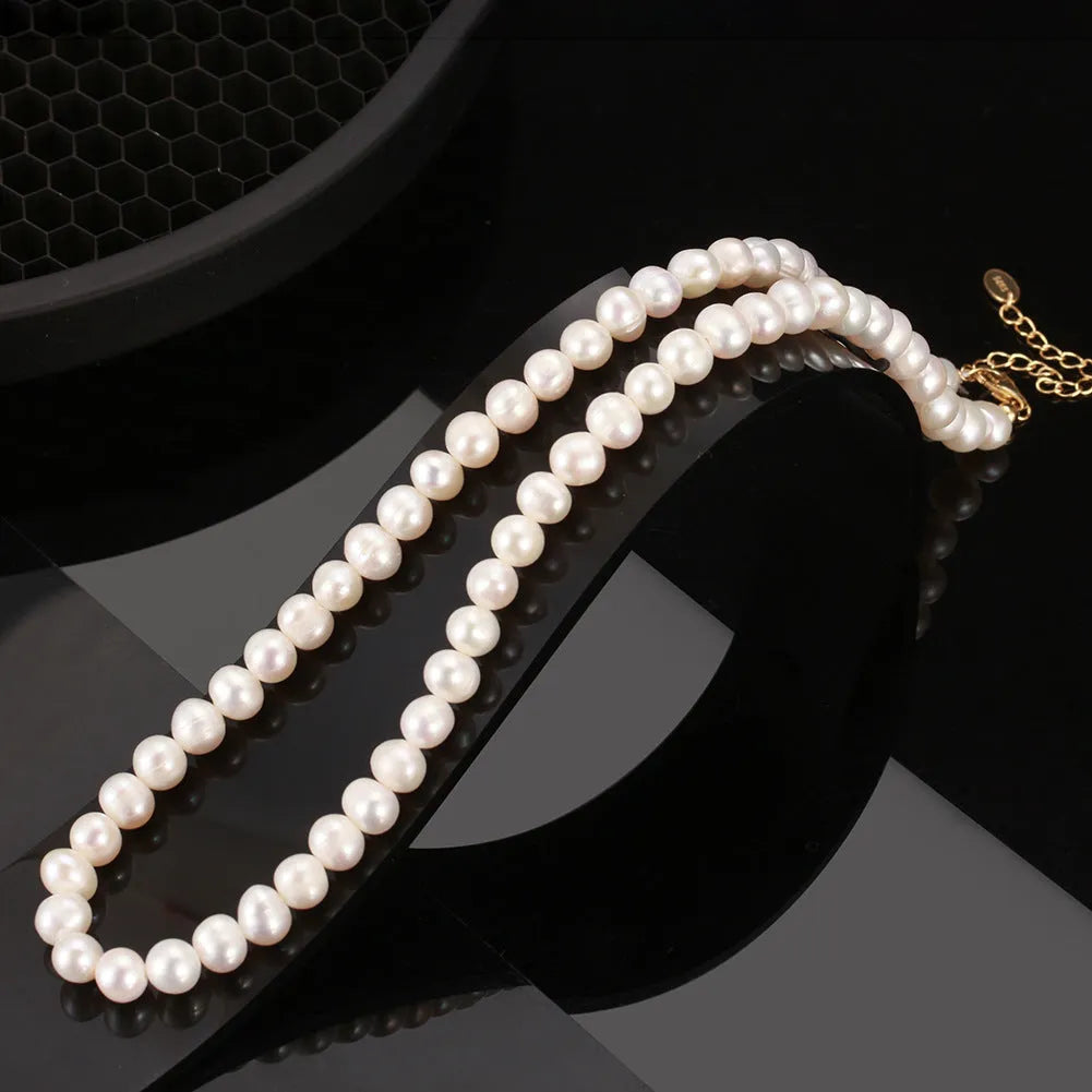 Women's adjustable freshwater pearl necklace with 6-7mm natural pearls on sterling silver chain