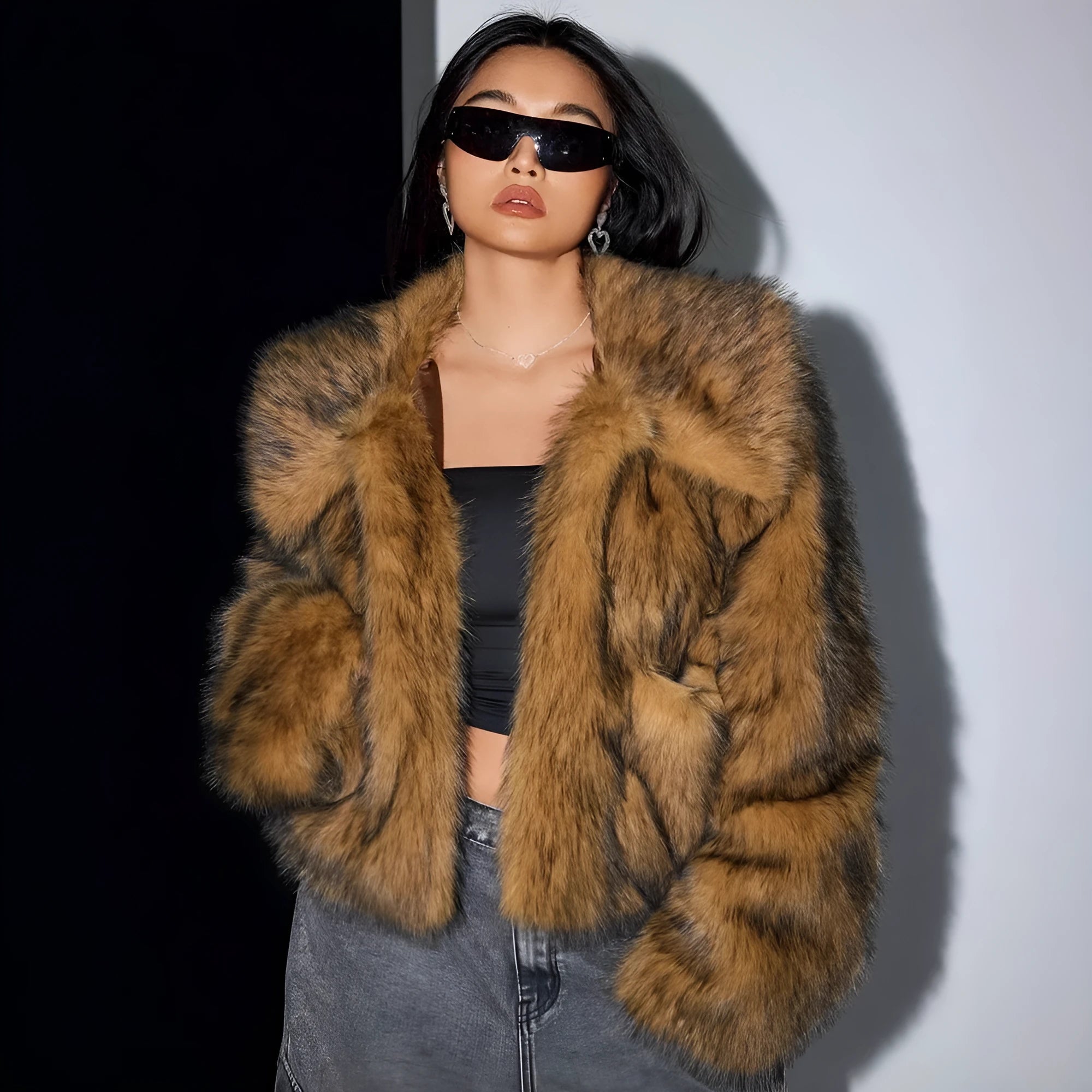 Short black artificial fur coat with a large fur collar, shown on a model.