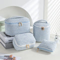Four cube-style flannelette makeup bags in polyester with modern simplicity design