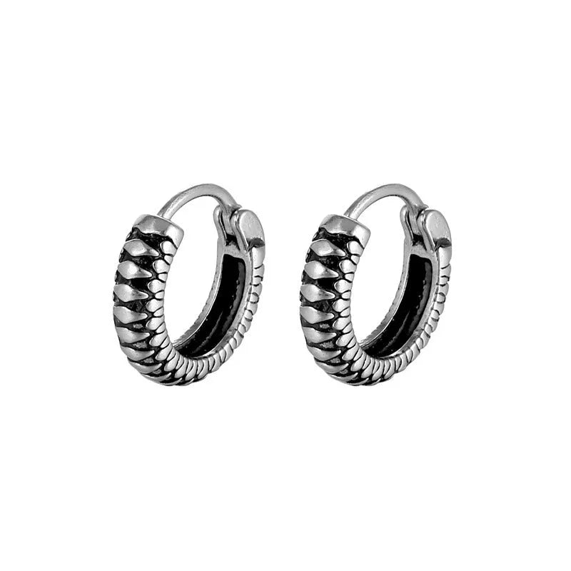 Geometric silver retro twist earrings with stripe detailing on circular titanium steel hoop