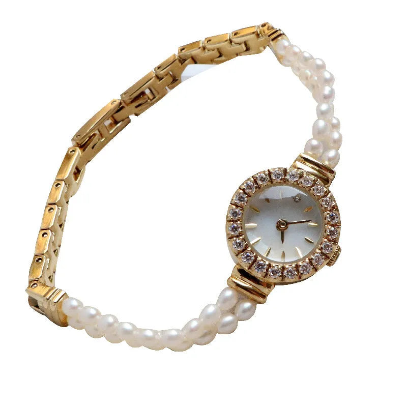Women's light gold bracelet watch with freshwater pearls and 18mm mineral glass dial