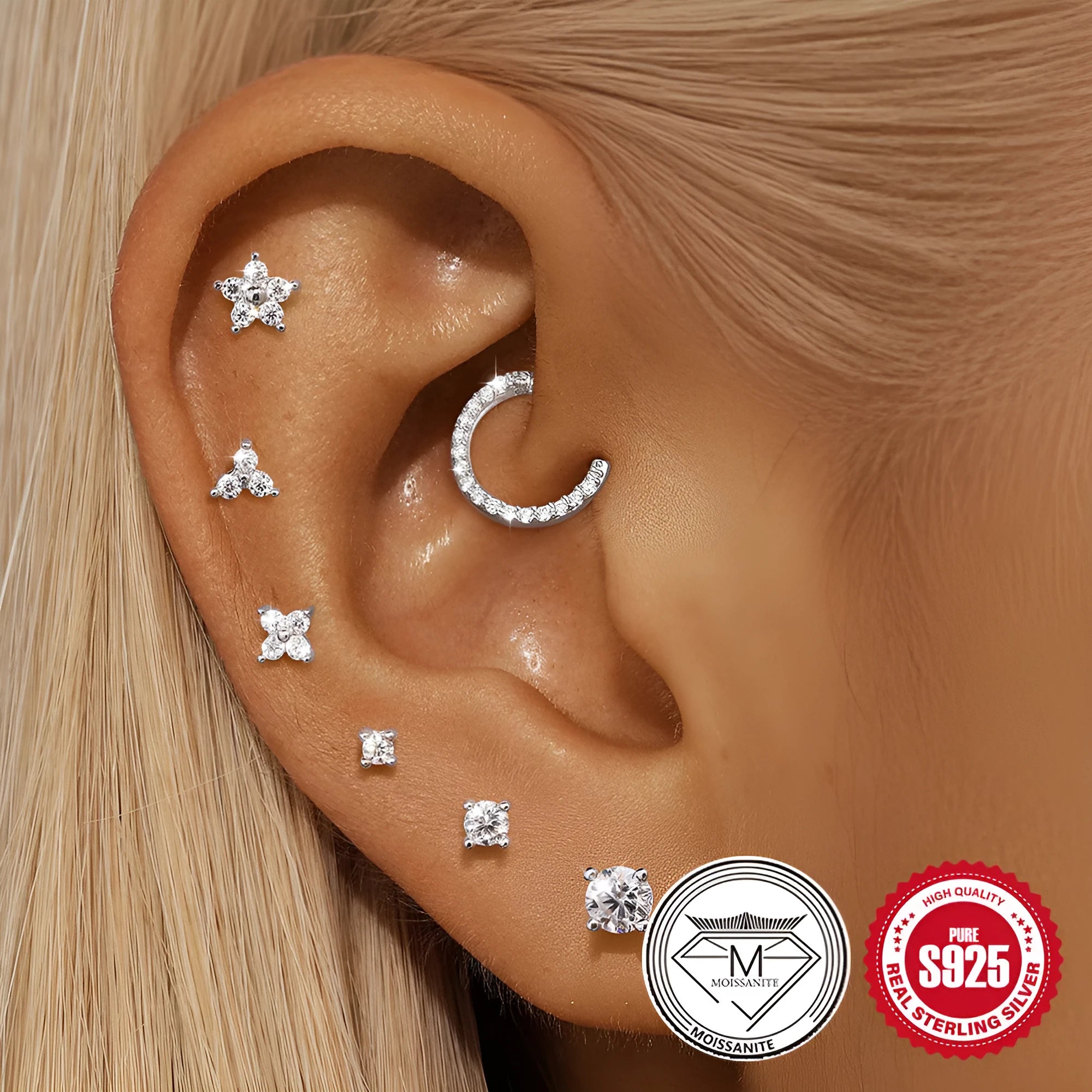 S925 sterling silver geometric petal stud earrings in platinum colour on ear.
