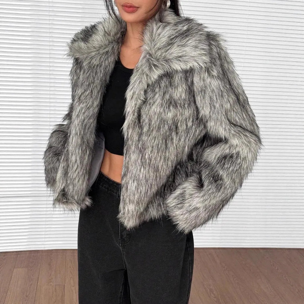 Short black artificial fur coat with a large fur collar, shown on a model.