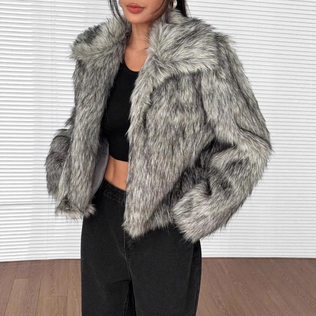 Short black artificial fur coat with a large fur collar, shown on a model.