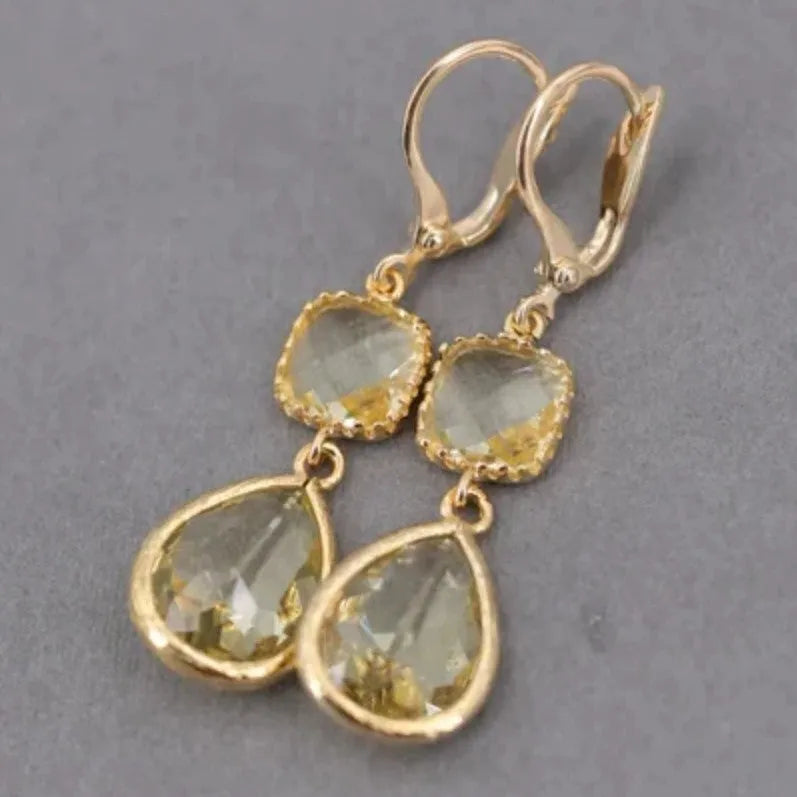 Gold geometric crystal fringe drop earrings with water droplet elements