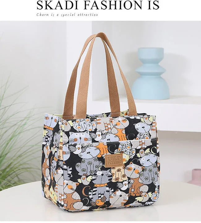 Women's printed canvas tote bag with aluminium frame in a square shape, showing floral and typographic design options.
