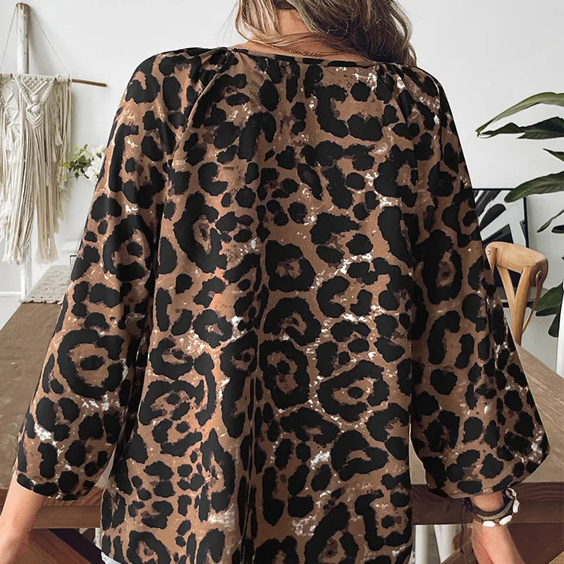 Women's multicolour leopard print V-neck pullover top with half sleeves and pleated detailing