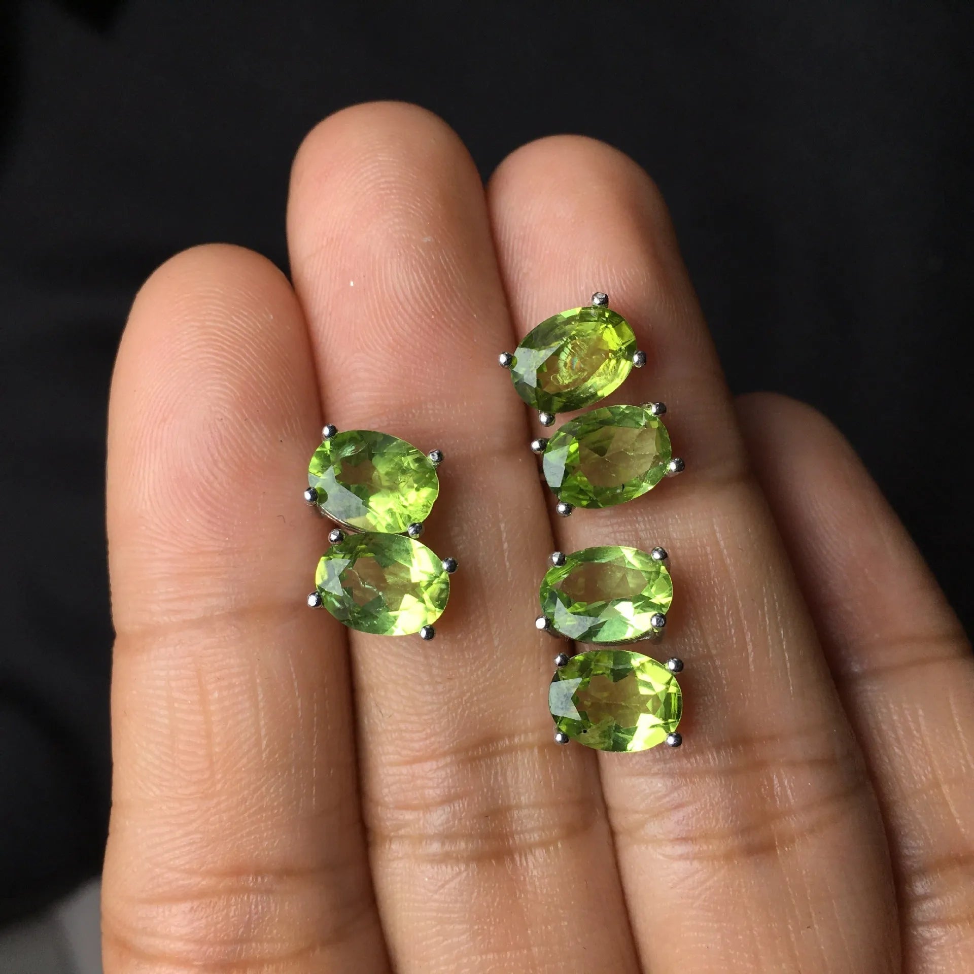 Natural olivine stud earrings in grass green set in S925 silver with 6×8mm oval faceted stone