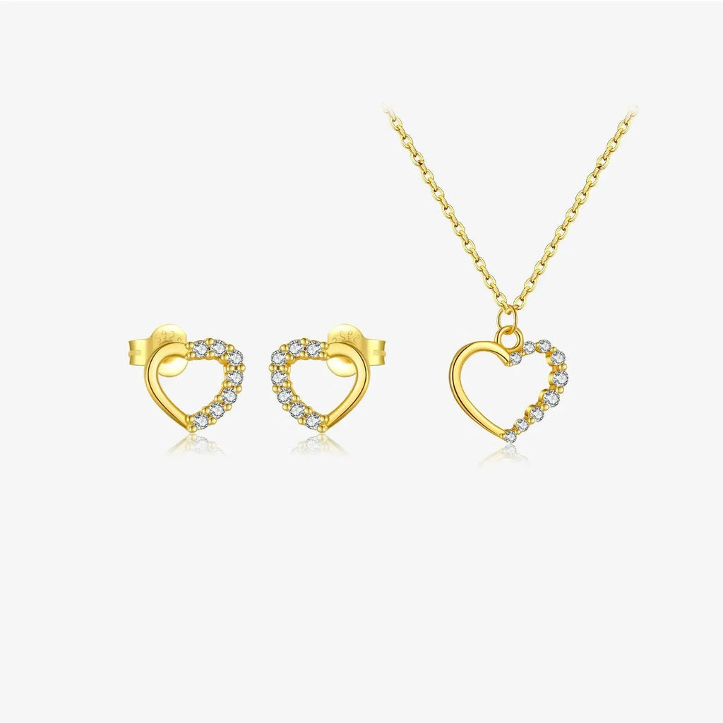Close-up of a sterling silver hollow heart pendant necklace on a regular chain.