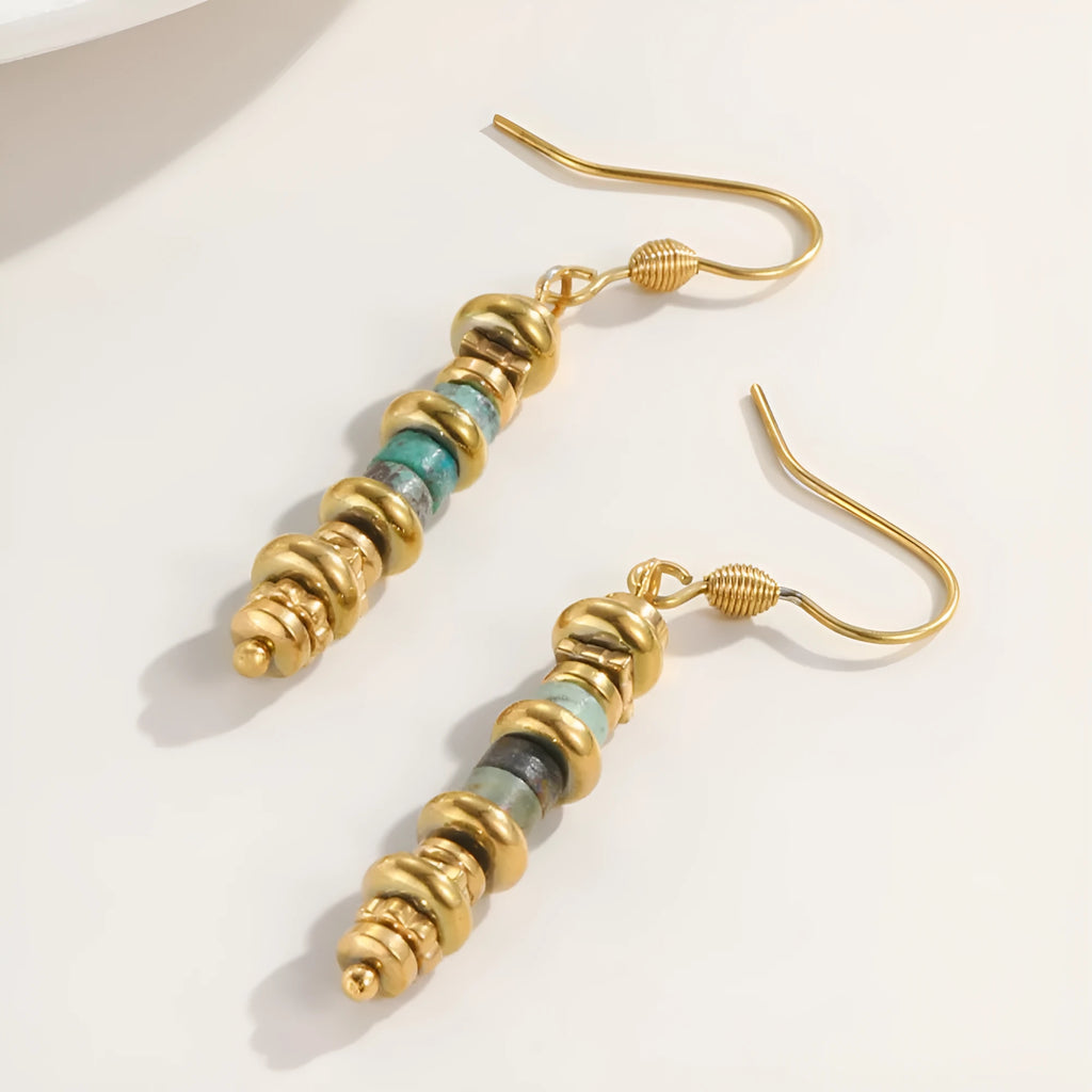 Gold geometric titanium steel dangle earrings with a retro design for women.