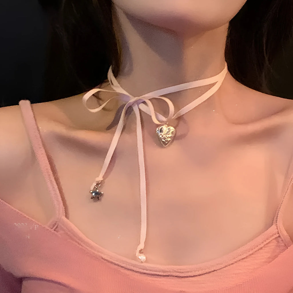 Women's alloy necklace with love pendant and ribbon charm on clavicle chain in electroplated finish