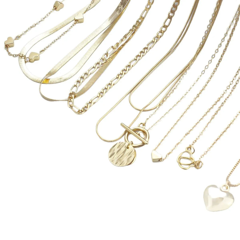 Set of 10 gold electroplated necklaces with alloy pendants on snake bone chains
