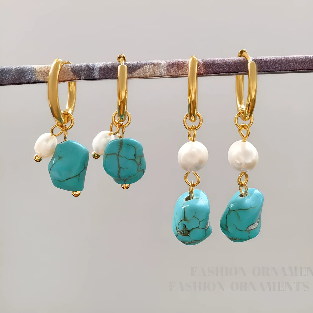 A pair of turquoise and cultured pearl clip-on earrings with irregular geometric copper shapes, showing both long and short styles.