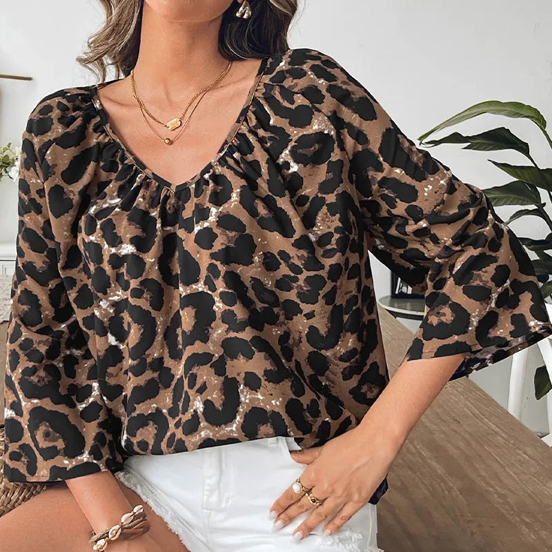 Women's multicolour leopard print V-neck pullover top with half sleeves and pleated detailing