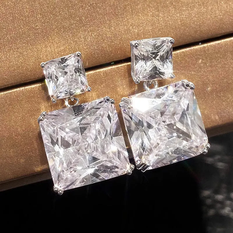Geometric square design copper earrings with quadrilateral elements in white gold or gold colour