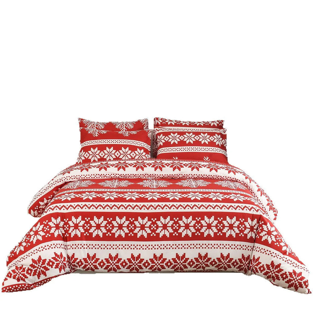Red Winter Sleepers Christmas Love Song pattern bed cover-style quilt cover and pillowcases on a bed.