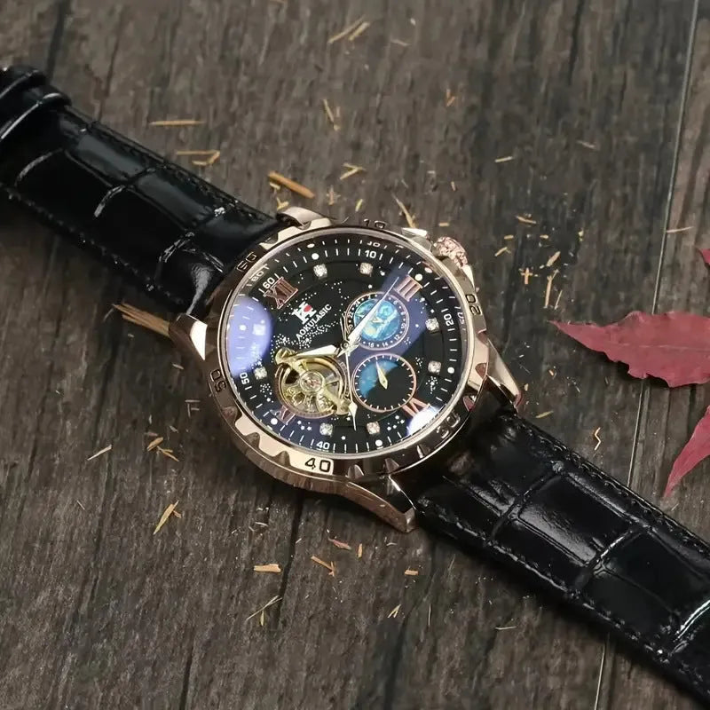 Men's rose gold skeleton automatic watch with black leather strap showing mechanical movement
