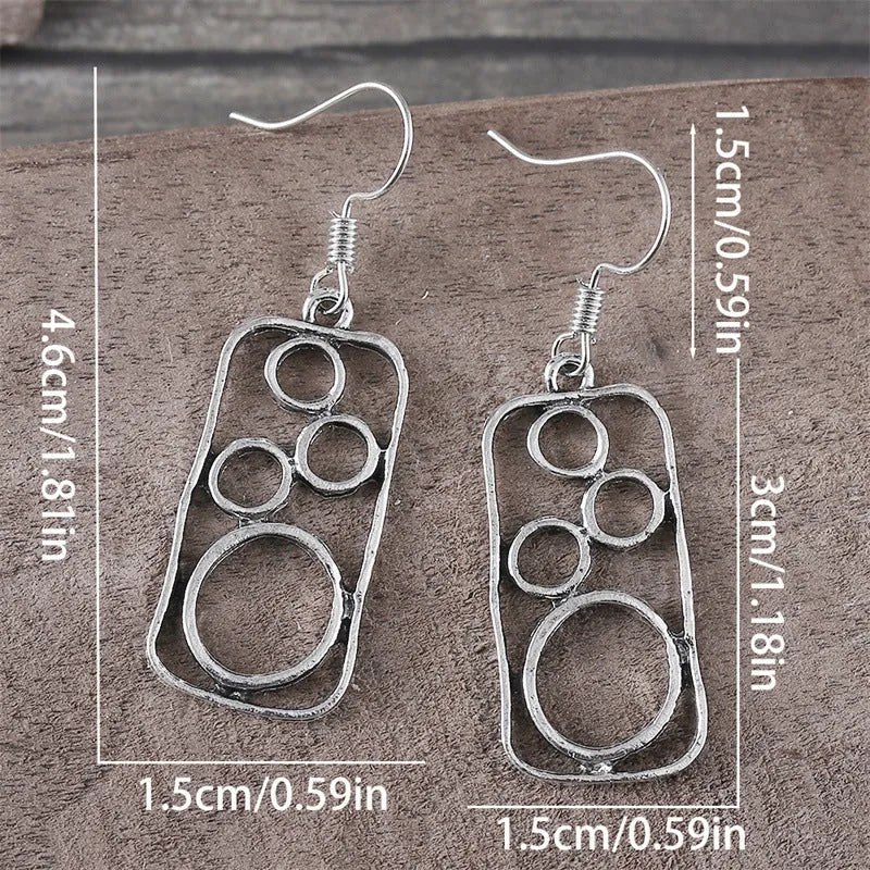 Geometric round earrings with irregular square design in antique silver finish