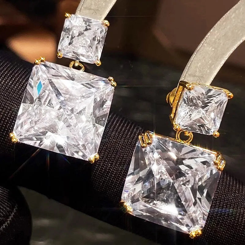 Geometric square design copper earrings with quadrilateral elements in white gold or gold colour